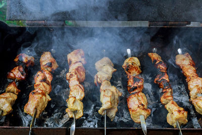 Close-up of meat on barbecue grill