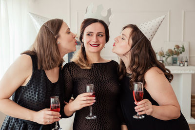 Smiling women enjoying party at home