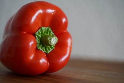 Close-up of red bell peppers on table