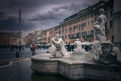 Statue of fountain in city