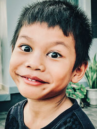 Close-up portrait of smiling boy