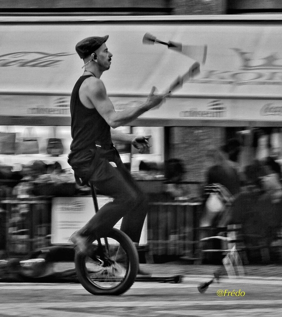 mode of transport, bicycle, cycling, transportation, real people, riding, motion, blurred motion, lifestyles, land vehicle, outdoors, leisure activity, one person, men, day, women, full length, sport, athlete, sportsman, adult, people