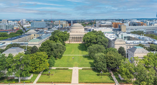 High angle view of trees and buildings against sky