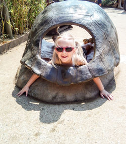 Portrait of smiling girl in tortoise shell