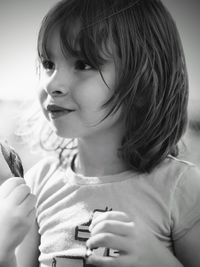 Close-up of girl holding hands