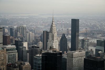 Chrysler building amidst cityscape against sky at manhattan