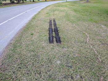 High angle view of empty road on field