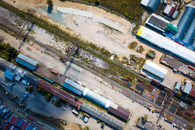 High angle view of buildings by street in city