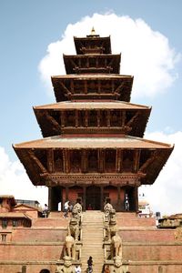 Low angle view of temple building against sky