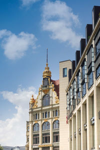 Low angle view of buildings against sky