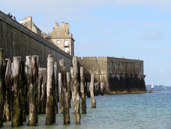 Panoramic view of old building by sea