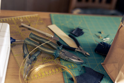 Close-up of work tool on table