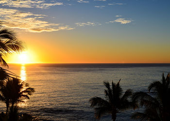 Scenic view of sea at sunset