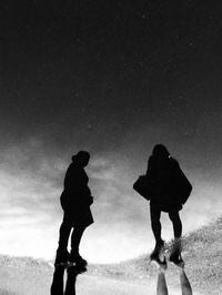Silhouette of men