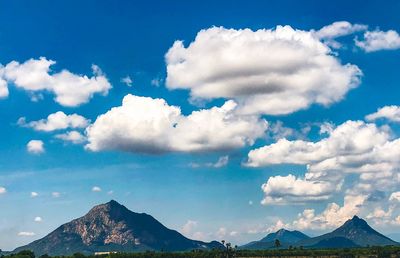 Panoramic view of landscape against cloudy sky