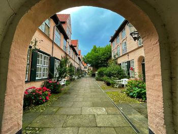 Alley amidst buildings in city