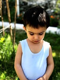 Cute boy standing outdoors