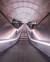 Low angle view of underground escalator