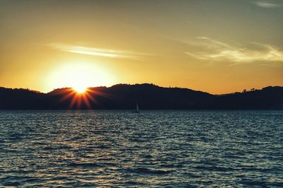 Scenic view of sea against sky during sunset