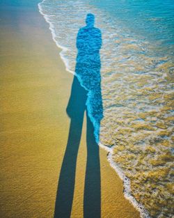 High angle view of shadow on beach