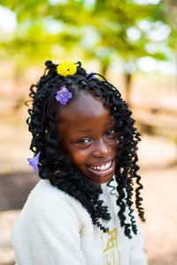 Portrait of young girl outdoor smiling happiness and cute