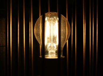 Close-up of illuminated light bulb