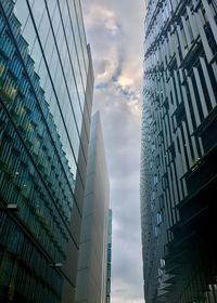 Low angle view of modern buildings against sky