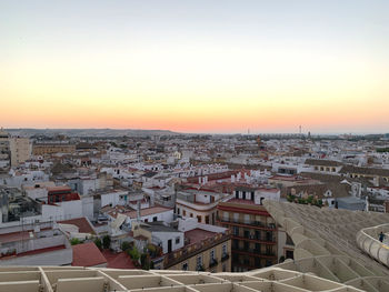 High angle view of townscape against sky during sunset