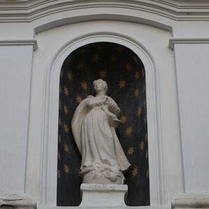 Low angle view of statue in front of building