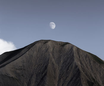 Low angle view of moon against clear sky