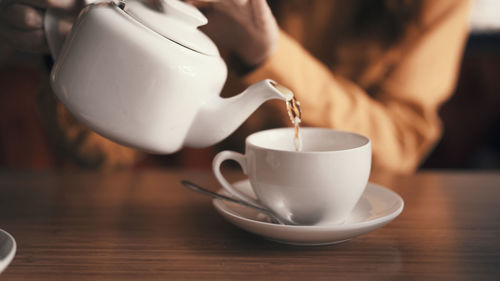 Close-up of coffee cup on table