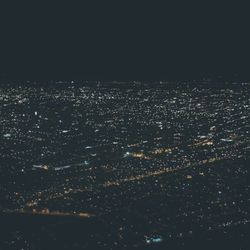 Aerial view of illuminated cityscape