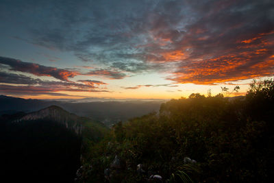 Scenic view of landscape against sky during sunset