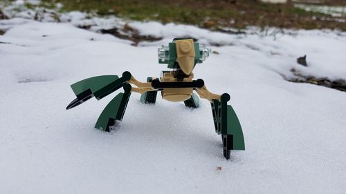 Umbrella on snow covered land