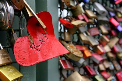 Close-up of love padlocks railing