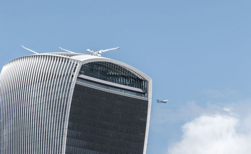 Low angle view of modern building against sky