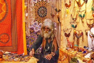 Sadhu selling souvenirs