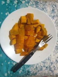 High angle view of chopped in plate on table