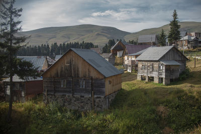 House on field against sky