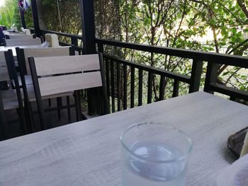 Empty chairs and tables in balcony