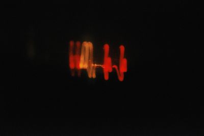 Close-up of red light bulb