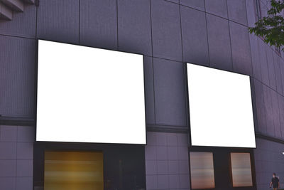 Reflection of building on glass wall