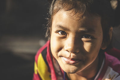 Close-up portrait of smiling boy