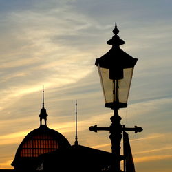 Low angle view of silhouette street light against sky during sunset