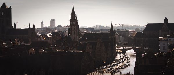Panoramic view of city buildings against sky