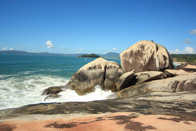 Scenic view of sea against clear blue sky