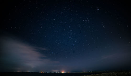 Scenic view of star field against sky at night