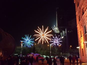 Firework display at night