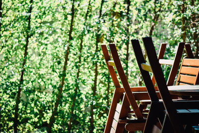 Empty chairs and tables in park