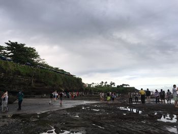 People on road against sky